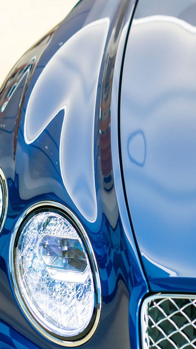 Man in front of vans