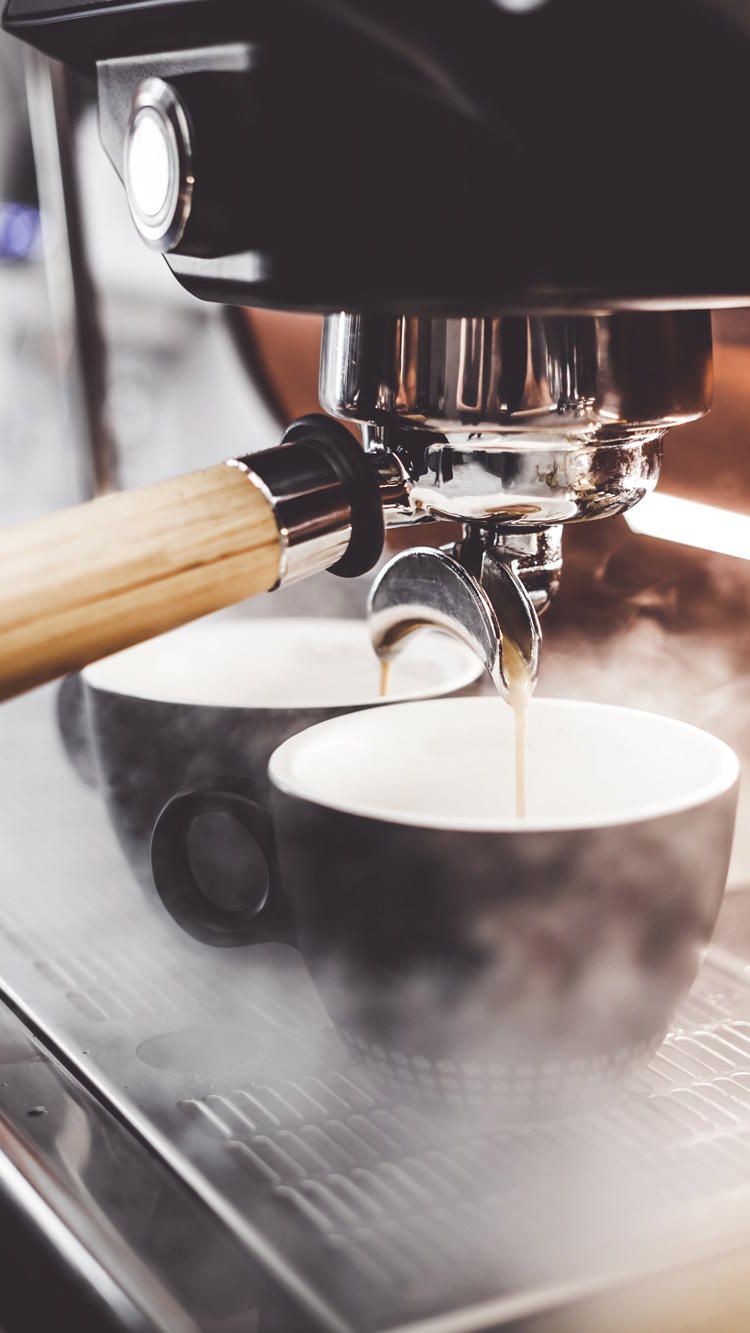 Man in front of a business