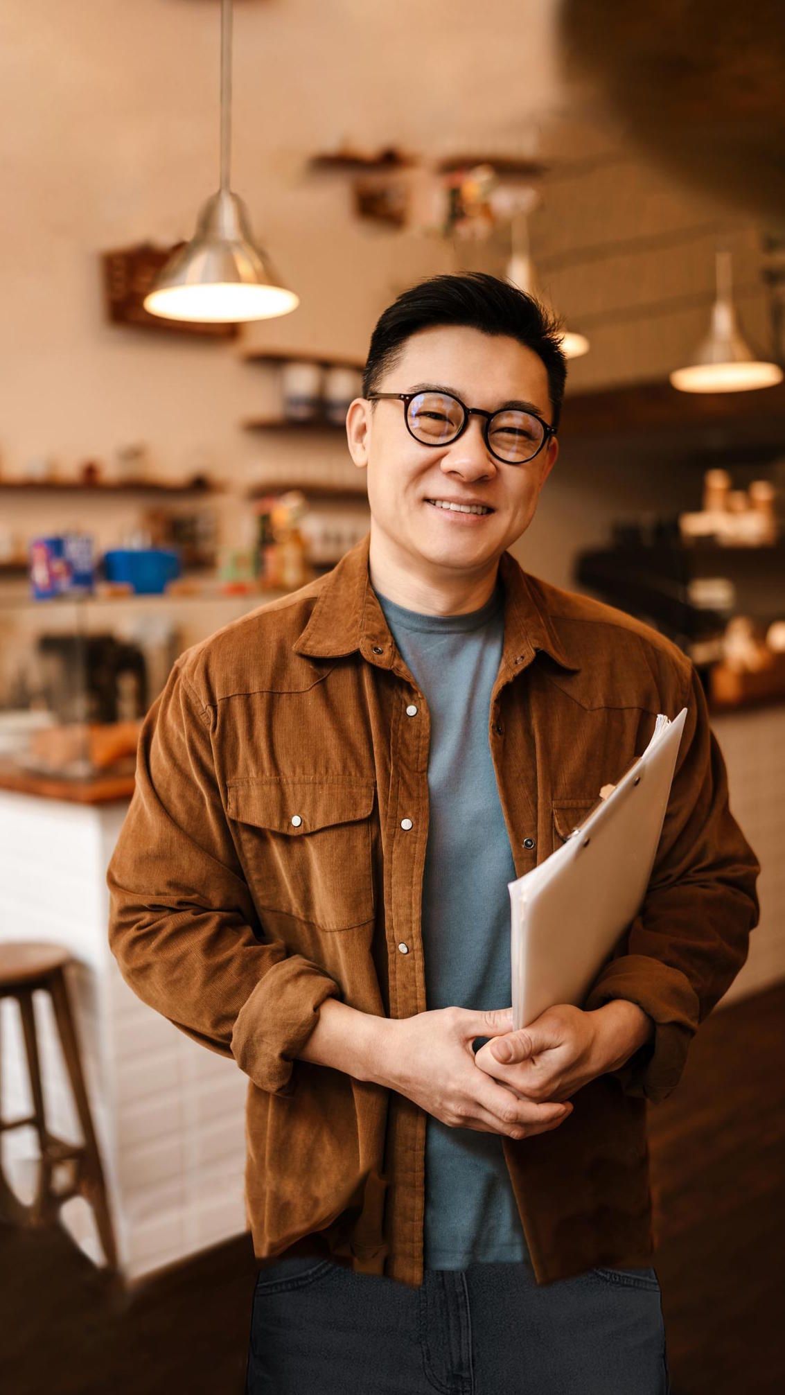 Man in front of a business